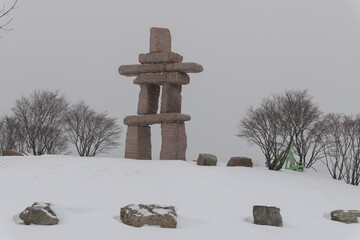 Obraz premium large wayfinding marker at The Toronto Inukshuk Park, 789 Lake Shore Blvd W during a winter storm on 2026-01-15 (north side)