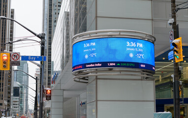 Obraz premium digital marquee sign outside First Canadian Place / BMO Group northwest corner of King St W and Bay St, Toronto
