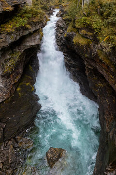 view of the powerful Slettafossen waterfall in the Rauma River near Verma in central Norway