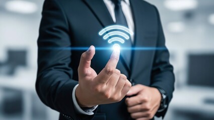 Businessman in a suit points his finger towards a brightly glowing wifi icon, symbolizing modern connectivity and communication.