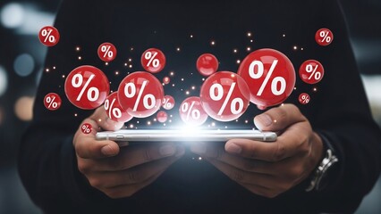 Hands hold a smartphone, from which red percentage signs float upwards, symbolizing digital discounts and promotions.