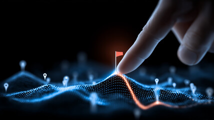 A human finger placing a red flag on a digital terrain map illustrating data driven strategy planning goal identification and performance analysis.
