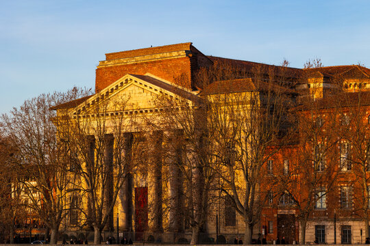 Fa&ccedil;ade of Notre-Dame de la Daurade Basilica at sunset seen from Pont Neuf in Toulouse