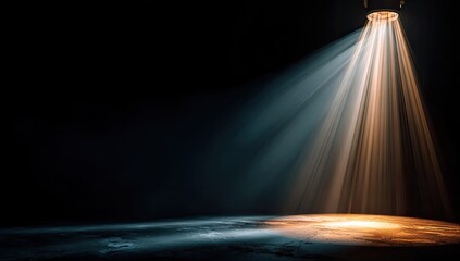 Dramatic spotlight illuminates a textured floor with beams of warm and cool light