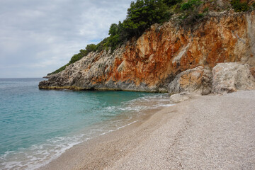 rocky edge of Gjipe Beach in Dhermi, Albanian riviera, Ionian sea