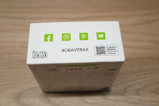 Gravitrax branding and social media icons on a white product box with QR code