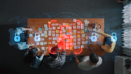 A top-down view of a brainstorming session featuring a team collaborating on sticky notes, surrounded by digital security elements, emphasizing creativity and innovation. Raster