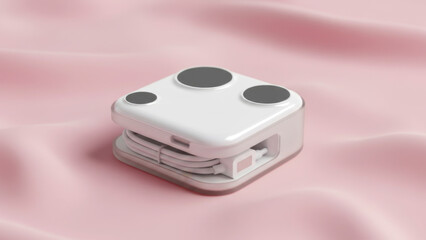A compact, foldable phone charger with a light, glossy finish, placed neatly on a soft light pink background