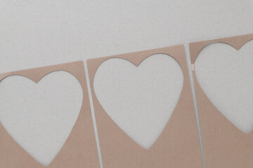 plain brown paper frames with heart shape cutouts