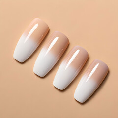 Glossy acrylic nails in monochrome gradient, laid out neatly.