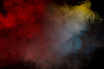 Blue and yellow steam on a black background.