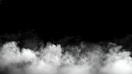 A low lying ethereal cloud of white smoke gently drifts across a completely dark black background creating contrast