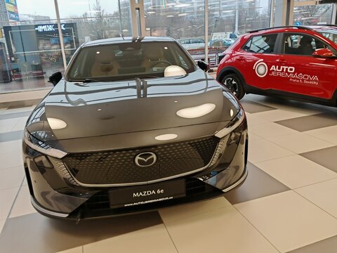 Prague,Czech Republic-14.01.2026: Mazda 6e electric vehicle displayed at an exhibition inside a shopping mall, presenting modern automotive design, electric mobility and brand promotion in a public 