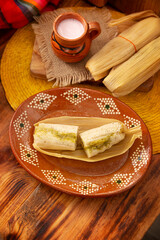 Tamales. Traditional dish typical of Mexico and some Latin American countries. Corn dough wrapped in corn leaves. The tamales are steamed.