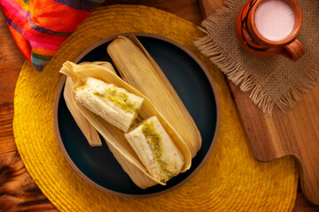 Tamales. Traditional dish typical of Mexico and some Latin American countries. Corn dough wrapped in corn leaves. The tamales are steamed.