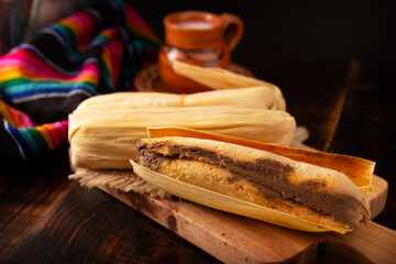 Tamales. Traditional dish typical of Mexico and some Latin American countries. Corn dough wrapped in corn leaves. The tamales are steamed.