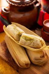 Tamales. Traditional dish typical of Mexico and some Latin American countries. Corn dough wrapped in corn leaves. The tamales are steamed.