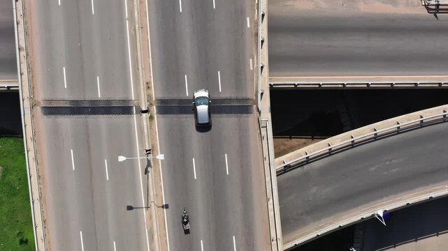 Traffic flows on the highway in Accra, Ghana during daytime hours