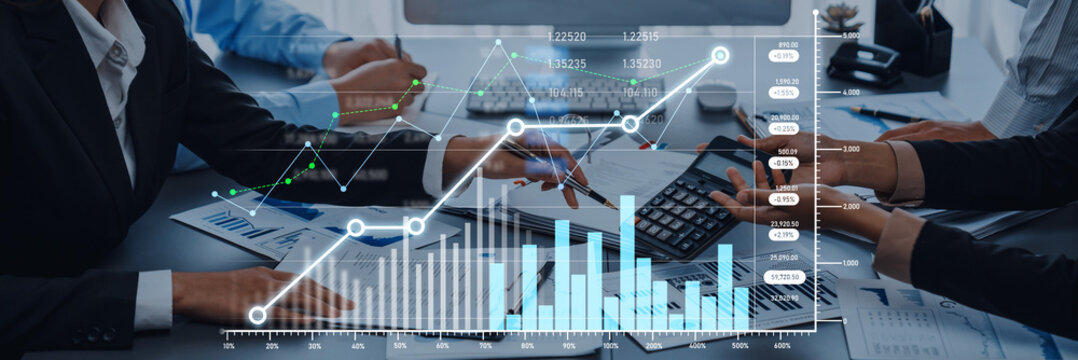 A professional business team engages in financial analysis during a meeting, using graphs and data visualization to drive informed decision-making and enhance growth. Scalp - Powered by Adobe