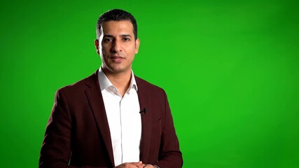 Middle Eastern Presenter Explains Business Concepts with Professional Gestures