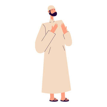 Bearded Muslim Man in Traditional Attire Showing Devotion