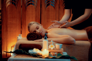 Aromatherapy massage ambiance or spa salon composition setup with focus decor candles and spa...