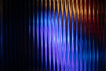 an abstract composition featuring vertically oriented blurred light streaks in shades of blue purple orange and black creating a dynamic and colorful effect