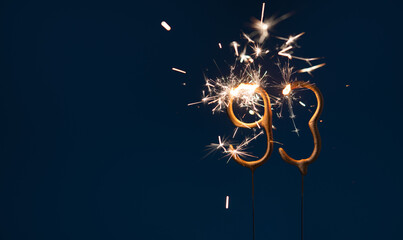 93 celebration festive background made with Bengal fires in the form of number Ninety three.