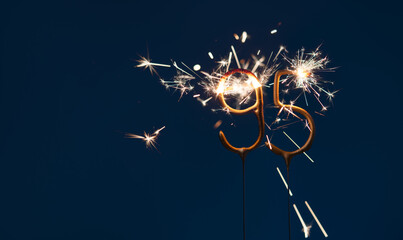 95 years anniversary celebration festive background made with Bengal fires in the form of number Ninety five.