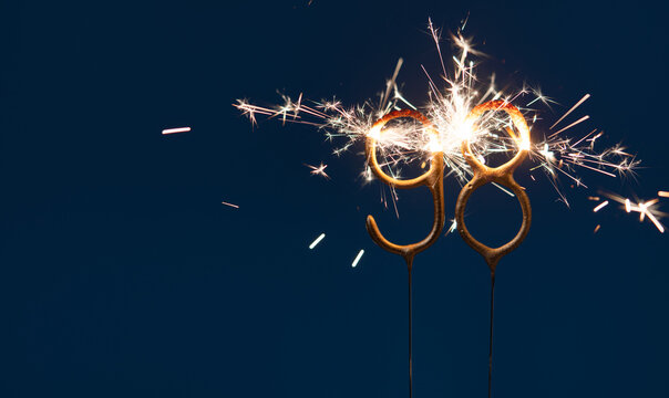 98 celebration festive background made with Bengal fires in the form of number Ninety eight.