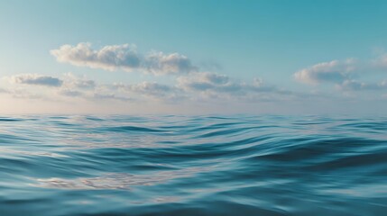 Obraz premium Calm ocean surface with gentle ripples reflecting soft sky light minimal seascape background peaceful atmosphere no boats or land