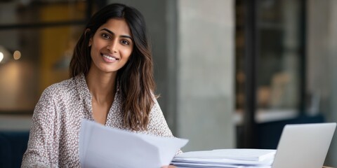 Confident asian young woman working with documents in modern office setting