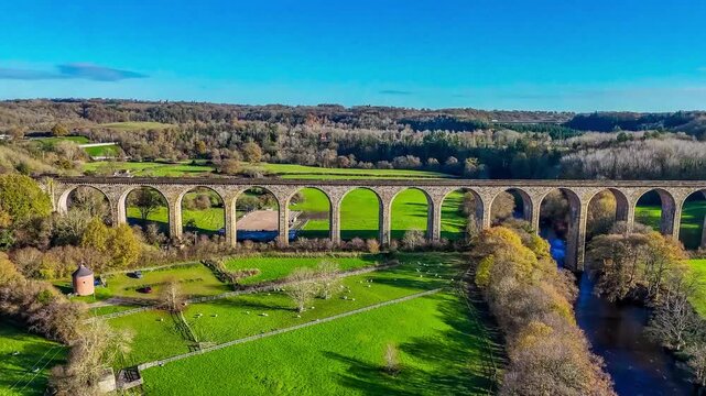 A receding aerial view flying away from the cefn viaduct near Chirk, Wales