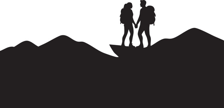 Silhouette of two people holding hands on a mountain peak