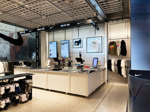 Nike store interior with checkout counters and apparel displays in Manchester, UK