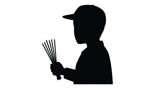 A striking black silhouette of a person holding a bundle of sticks silhouette