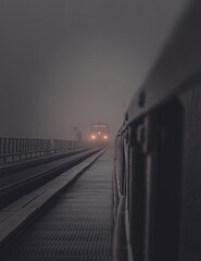 rain in the fog on a bridge