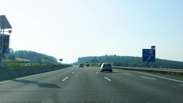 Street view of German autobahn or highway, freeway driving on the A8 in Baden-W&uuml;rttemberg to Stuttgart as time lapse 