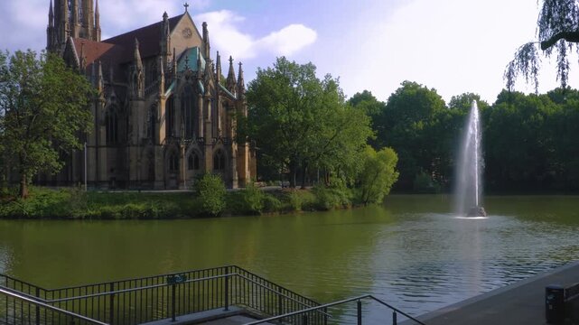 Street view of the Protestant Church of St John (German: Johanneskirche) in Stuttgart . On a sunny day in Spring