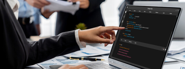 Business intelligence and data analysis concept. Analyst team working on financial data analysis dashboard on laptop screen as marketing indication for effective business strategic planning. Insight