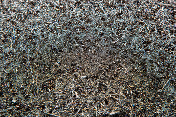 Industrial background with metallic filings