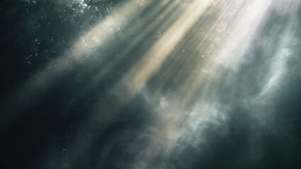 Fototapeta premium Dramatic Light Rays Through Cloudy Sky
