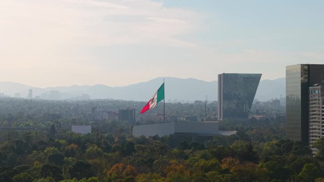 MEXICO FLAG WAVING IN SUNSET