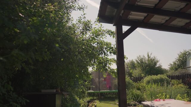 Garden Patio Retreat, Relaxing Outdoor Garden Space, Peaceful Garden Area Beneath Pergola With Lush Greenery, Quiet Outdoor Veranda Overlooking Vibrant Green Garden With Wooden Supports