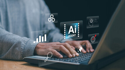 AI agent technology concept. Businessman using laptop with virtual interface icons, automation, data analysis, machine learning, digital assistant and smart business workflow innovation.