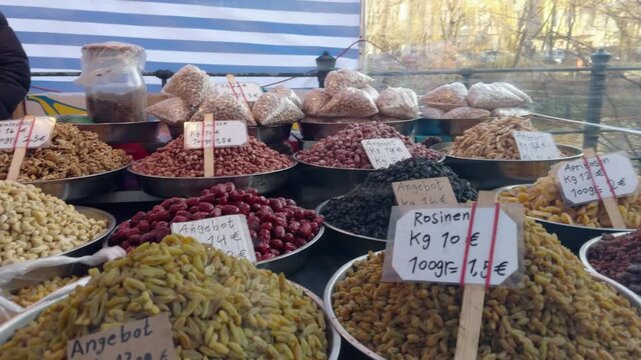 Camera movement in front of Dry fruits and nuts at Turkish Market. Maybachufer,  Berlin. 