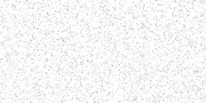 Subtle mosaic pattern of small irregular grey and white polygonal shapes creating a textured abstract background for design and decoration