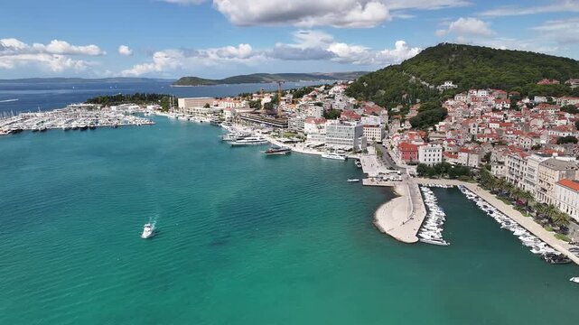 Aerial view of Split's west coast with yachts and Adriatic waves.