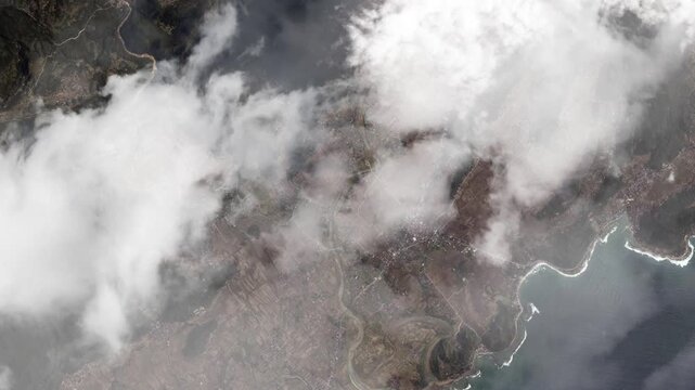 Coastal landscape of Santa Maria in the Philippines with clouds moving overhead, animation based on Nasa imagery