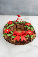 A garland of brownies and cookies with chocolate, decorated with marzipan_vertical.